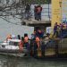 Russia. - National Insight News Russian rescue workers carry a body from the wreckage of the crashed plane, at a pier just outside Sochi, Russia, Sunday, Dec. 25, 2016. Russian ships, helicopters and drones are searching for bodies after a plane carrying 92 people crashed into the Black Sea. The plane was taking the Alexandrov Ensemble,...  (Associated Press)