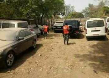 operatives of the EFCC inside the warehouse
