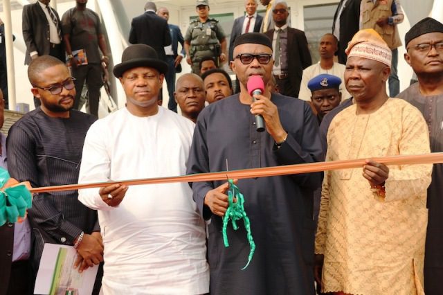 SAM 3 (2) - National Insight News Ondo State Governor, Dr Olusegun Mimiko (middle), cutting the tape to
inaugurate The Dome, with him is Deputy Governor, Alhaji Lasisi
Oluboyo (2nd right), Member representing Okitipupa/Irele at the House
of Representatives, Hon Mike Omogbehin (right), Special Adviser to the
President on Niger Delta Affairs, Brigadier General Paul Boroh (Rtd)
(2nd left), and Special Assistant to the Vice President on National
Economic Council, Donald Wokoma (left)