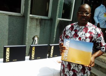 Dayo Adedayo holding Ngeria 2.0