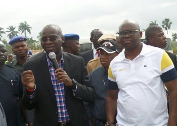 Minister of Works, Transport and Housing Babatunde Raji Fashola and  Governor Ayo Fayose during Fashola's visit to Ekiti