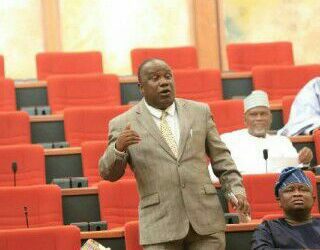Senator  Abdulfatai Buhari 
 while presenting the motion