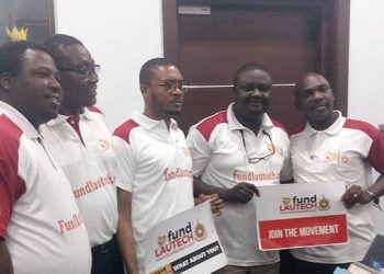 Shina peller with some members of fundLAUTECH initiative during a visit to his office in Lagos