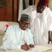 Buhari resume work - National Insight News President Buhari signing a letter