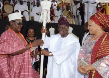 L-R: Ekerin Olubadan of Ibadanland, Oba Abiodun Kola-Daisi; Oyo State Governor, Senator Abiola Ajimobi; and his wife, Florence, during the presentation of staff of office and certificates to the high chiefs and baales who were promoted as obas by the governor, at Mapo Hall, Ibadan... on Sunday. Photo: Governor's Office