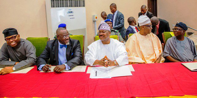info Summit (1) - National Insight News Governor Abiola Ajimobi of Oyo State (middle), his counterpart from Ekiti, Mr. Ayodele Fayose (second right), the Secretary to the Oyo State Government, Mr. Ishmaell Alli (left), Commissioner for Information, Culture and Tourism, Mr. Toye Arulogun (second left) and a veteran Journalist, Mr. Felix Adenaike at the first Oyo State Information Summit held in Ibadan