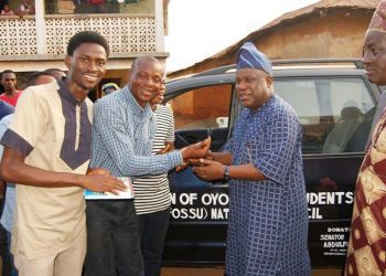Senator Abdulfatai Buhari Presenting a car key to President Federation of Oyo state Student Union FOSSU, Sarafudeen Azees while Hon Abiodun Adeyemo, Chairman Ogbomoso South West LCDA watches