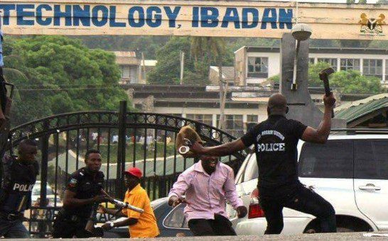 IAR AND T - National Insight News A member of staff  of the institute Mr Olanrewaju Johnson and Police officers  during the clash , photo credit ;facebook.com/DanielOluwaleke Akindele