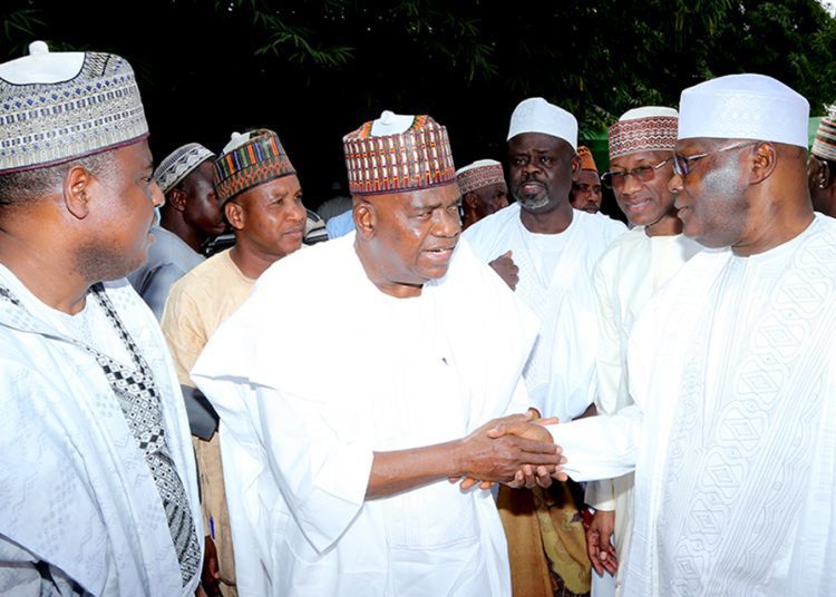 Chairman, House of Representatives Committee on Media and Public Affairs, Hon. Abdulrazaq Namdas, Sen. Danjuma Goje, Sen. Magatakarda Wamako and former Vice President Atiku Abubakar after Friday prayers, at Asokoro Jumu'at Mosque, Abuja.