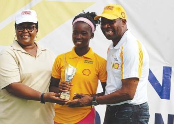 Winner, Girls 16 & MOP, Omolayo Bamidele (middle) receiving from her trophy from Ogunjoye (left) and Ikhanna Mborah of the Sports Ministry at the end of the SNEPco Junior Tennis Championship in Lagos…at the weekend.