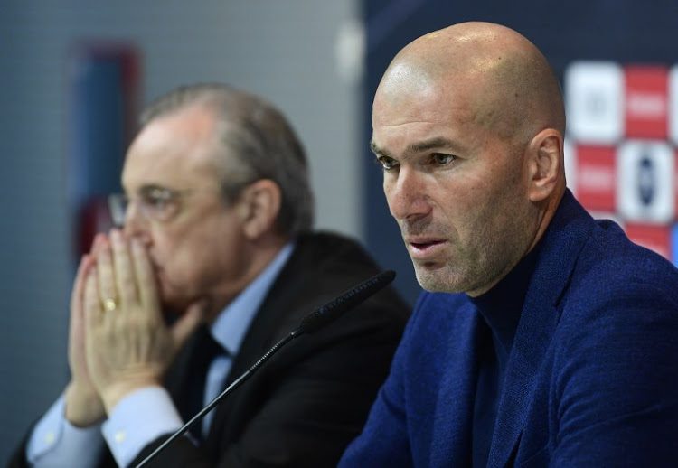 Zidane - National Insight News Real Madrid's French coach Zinedine Zidane (R) sits beside president Florentino Perez, during a press conference to announce his resignation in Madrid on May 31, 2018.
Real Madrid coach Zinedine Zidane said today he was leaving the Spanish giants, just days after winning the Champions League for the third year in a row.
 / AFP PHOTO / PIERRE-PHILIPPE MARCOU
