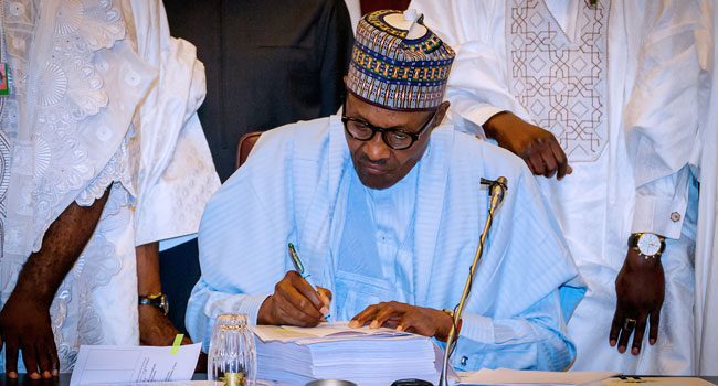 President-Buhari-Signs-2018-Budget-3 - National Insight News quarantine act 2020