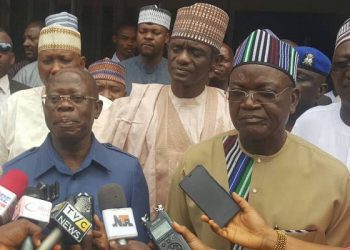 Samuel Ortom and Adams Oshiomole after the meeting in Abuja