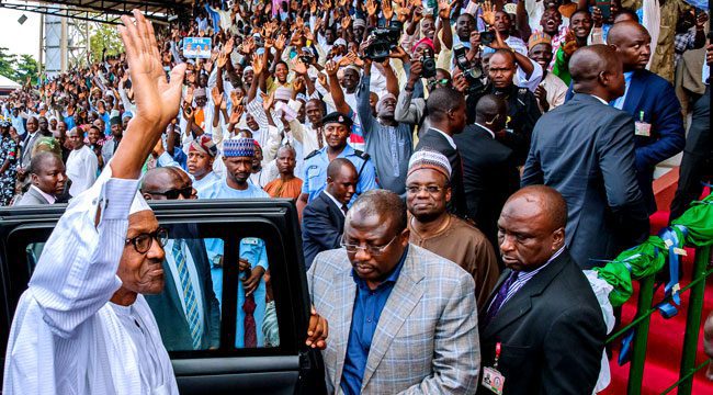 President-Buhari-In-Bauchi-On-August-2-2018 - National Insight News President Buhari waves at supporters as he arrives at a rally in support of APC’s candidate for the Bauchi South Senatorial District bye-election on Thursday… August 2, 2018