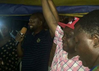 Dr Hassim Adda  leader of APC National Team announcing Senator Abdulfatai Buhari as the winner of Oyo North Senatorial District while Sarah Egye Amiyawa another  member of the team watches