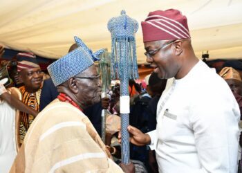 Oyo State Governor, Seyi Makinde (right) presenting Staff of Office to Balogun of Ibadanland, Oba Owolabi Olakulehin during the coronation ceremony of High Chiefs of Ibadanland that represent Olubadan at the eleven Local Government Traditional Councils as Beaded Crown-Wearing Obas by Olubadan, held at Mapo Hall, Ibadan. PHOTO: Oyo Gov's Media Unit.