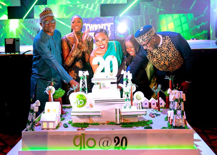 National Commercial Co-ordinator, Yomi Ogunbamowo; Group Executive Director, Sade Michael-Adenuga; Executive Vice Chairman, Mrs Bella Disu; Director of Customer Care, Catherine Bomett, and Chief Retail Sales Officer, David Maji, cutting the anniversary cake.