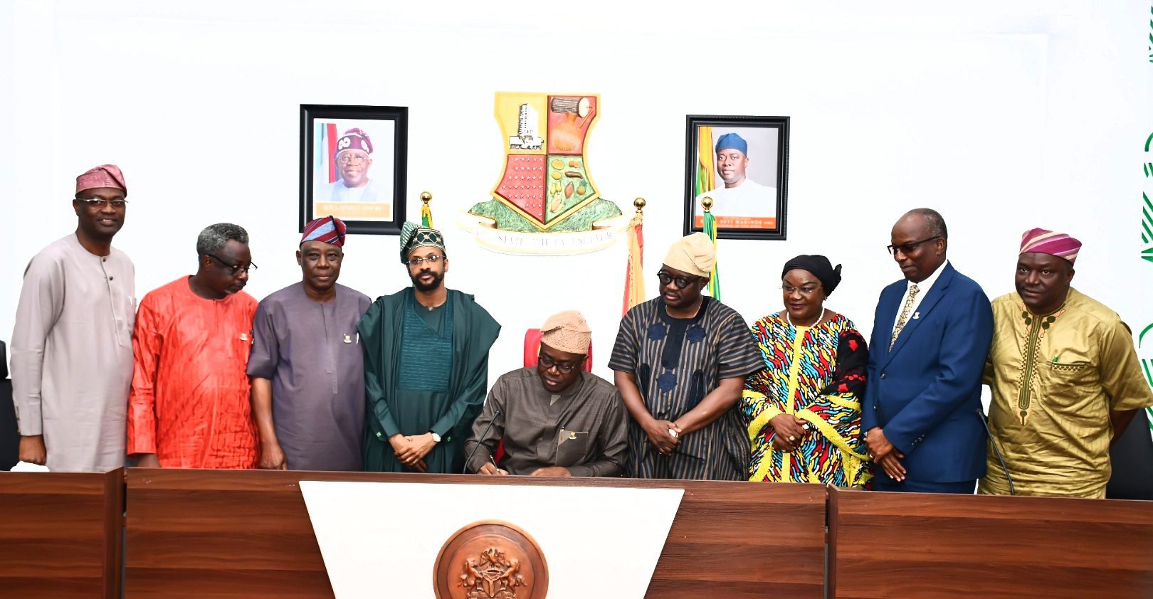 1a_2 Oyo State Governor, Seyi Makinde (middle); signing the bill to rename The First Technical University, Ibadan as Abiola Ajimobi Technical University, Ibadan to law, with him from left are, the University Vice Chancellor, Prof Sola Ajayi; Pro-Chancellor, Ladoke Akintola University of Technology, Prof Deji Omole; deputy governor of Oyo State, Barr Bayo Lawal; son of former governor of Oyo State, Mr Idris Ajimobi; deputy Speaker of Oyo State House of Assembly, Hon Biodun Fadeyi; Senator Mosurat Sunmonu; representative of Chief Judge of Oyo State, Justice A L Akintola and Commissioner for Education, Prof Saliu Adelabu, held at Executive Chamber, Governor's Office, Secretariat, Ibadan. PHOTO: Oyo Gov's Media