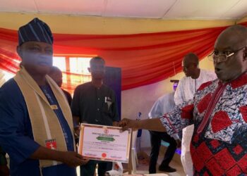 Re-elected president of
Ibadan Christ Apostolic Grammar School Old Boys Association (ICAGSOBA) receiving certificate of returns
