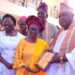 1738773433864 - National Insight News The wife of Pastor Dr. Ayo Ogunranti receiving the post humous award for her husband
