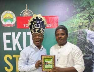 Mr Adeshina Ademola.presentinparaphernalia of induction to Barrister Wale Ojo Lanre