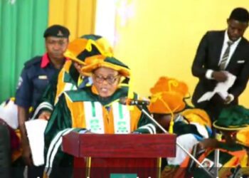 Rector addressing the students