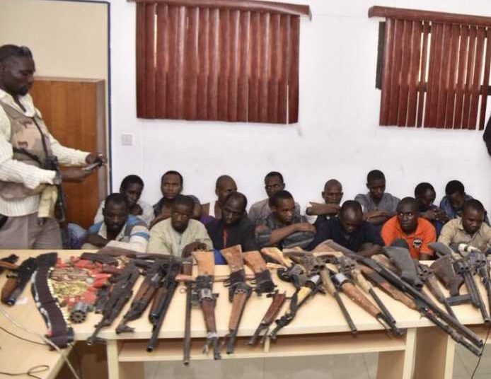 the suspects and the recovered firearms recovered from the , photo source www. thecable.com