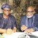Outgoing Governor of Ondo State, Dr Olusegun Mimiko (left) and the
Incoming Governor, Rotimi Akeredolu (SAN), signing the handover notes