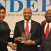 l-r: Director, Independent Newspapers, Adaobi Nwakuche, presenting the award of the Most Innovative Bank won by UBA Plc to the Divisional Head, Digital and Consumer Banking, United Bank for Africa( UBA) Plc, Mr Yinka Adedeji while Managing Director, Independent Newspapers, Mr. Ted Iwere looks on, at the Independent Newspapers Awards, held in Lagos at weekend