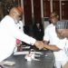 Ondo State governor, Mr Oluwarotimi Akeredolu, SAN, receiving the two lawmakers of the state House of Assembly, Hon Olugbenga Araoyinbo (Majority Leader) and Hon Malachi Comer, to the APC fold, yesterday, at Governor's Office, Akure, shortly after their defection from the PDP