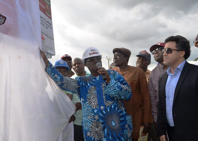 Governor Abiola Ajimobi of Oyo State (left), his deputy, Chief Moses Adeyemo (second left), Secretary to the State Government, Mr. Olalekan Alli (second right) and the Executive Director, Charvet Nigeria Limited, Issam Abu Hassan (right) at the flag off  of the 11.4 km Agodi Gate-Alakia Adebayi Junction with spur to Alakia- Ibadan Airport Road on Tuesday in Ibadan.