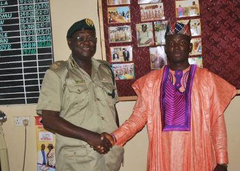 Prince Tayo Adekunle and Mr Sunday Esan, Deputy Comptroller, NPS Abolongo prision Oyo