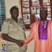Prince Tayo Adekunle and Mr Sunday Esan, Deputy Comptroller, NPS Abolongo prision Oyo