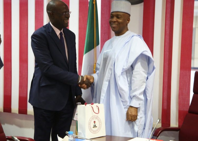 Senate President 
 Dr Bukola Saraki 
 WelcomingMohammed Malick Fall, Head of  UNICEF delegation in the country during a visit to his office ,