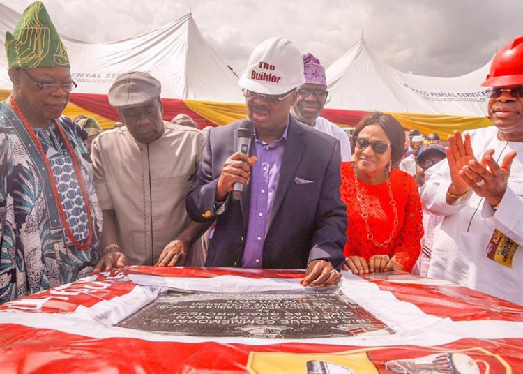 Governor Abiola Ajimobi, flanked by his wife and Deputy, representative of Olubadan and other dignitaries at the official flagg off of Ibadan Circular road on friday