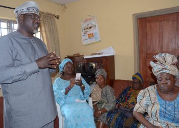 Oyo State Commissioner for Information, Culture and Tourism, Mr. Toye Arulogun commiserating with the head of Faleti's family, Elder Adegoke Faleti, during a condolence visit to Alagba Adebayo Faleti's house in Ibadan on Monday.