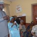 Oyo State Commissioner for Information, Culture and Tourism, Mr. Toye Arulogun commiserating with the head of Faleti's family, Elder Adegoke Faleti, during a condolence visit to Alagba Adebayo Faleti's house in Ibadan on Monday.