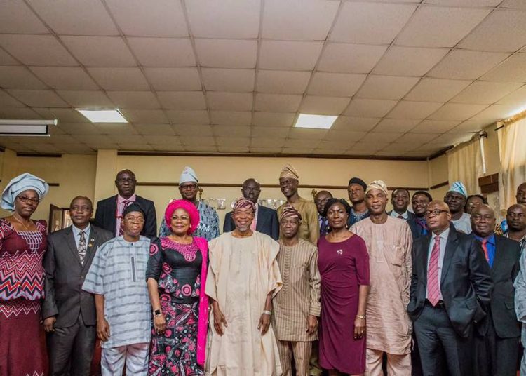 Gvernor Rauf Aregbesola in a  group photograph with LAUTECH governing council and management staff after a meeting in his office on  thursday
