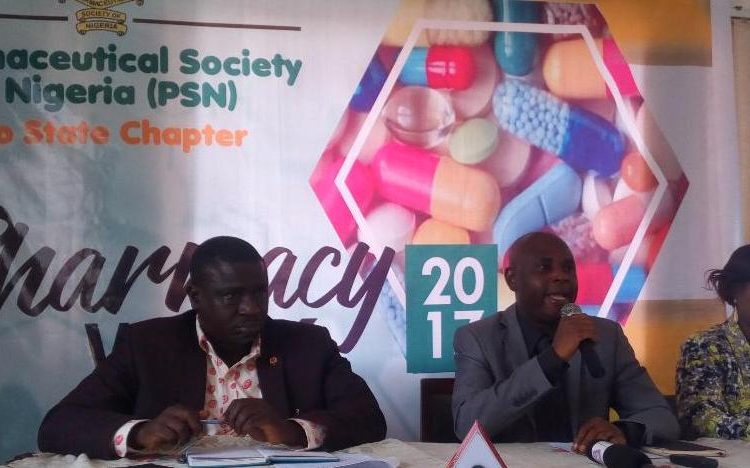 Pharmacists Abiodun Ajibade, Chairman Oyo state Branch of Pharmaceutical Society of Nigeria  flanked by  immediate past chairman and  another key member of the Association