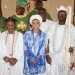 Alaafin of Oyo flanked  two of his Oloris and Otunba Gani Adams, Aare Ona Kakanfo of Yorubaland and wife at the catholic church in Oyo  during the thanksgiving services
