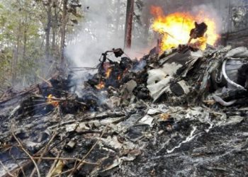 This photo released by Costa Rica's Civil Aviation press office shows the site of a plane crash in Punta Islita, Guanacaste, Costa Rica, Sunday, Dec. 31, 2017. A government statement says there were 10 foreigners and two Costa Rican crew members aboard the plane belonging to Nature Air, which had taken off nearby. (Costa Rica's Civil Aviation press office via AP)
