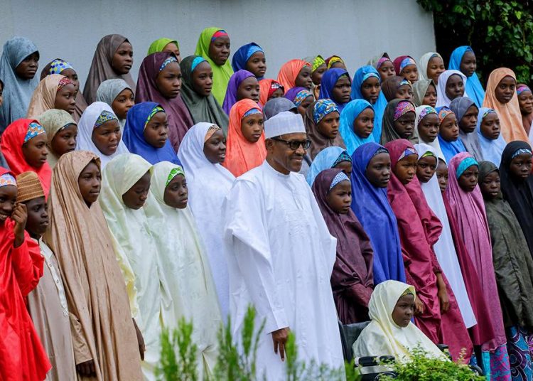 President in a group photograph with the Dapchi girls