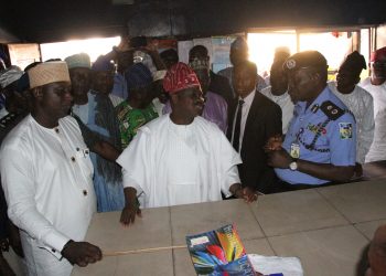 Governor Abiola Ajimobi of Oyo State (middle), the Commissioner of Police, Oyo State Police Command, Mr. Abiodun Odude (right) and the Chairman, Aare Latosa Local Council Development Area (LCDA), Mr. Adekunle Oladeji during the governor's inspection visit to the police station at Bodija Market.