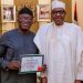 Fayemi with President Buhari displays his certificate of return