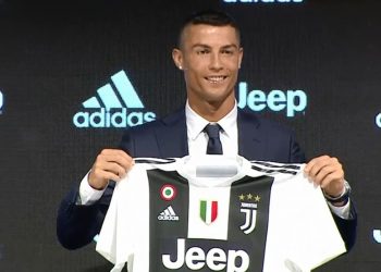 Ronaldo showing his Jersey after passing Juventus Medicals