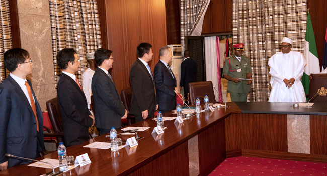 President Muhammadu Buhari, Chairman of China Railway Construction Corporation Limited (CRCC), Mr Chen Fenjian, General Manager, Overseas Dept (CRCC), Mr CAO Baogang, President CRCC, Mr Zhao Dianlong, President of CRCC International Limited, Mr Mo Wenhe during an audience at the State House, Abuja. PHOTO; SUNDAY AGHAEZE. MAY 10 2019.
