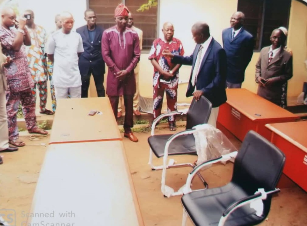 Hon Bamigboye presenting Some of the furniture to the the  officials of TESCOM