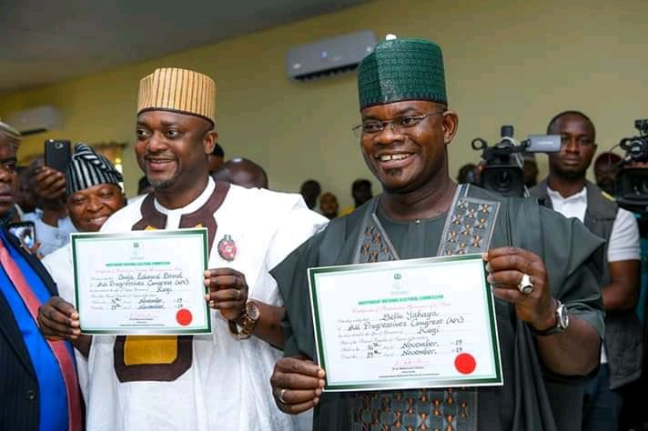 Governor Yahaya Bello and his Deputy Edward Onoja with their certificate