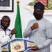 Oyo State Governor, Engr Seyi Makinde (right) and World Boxing Federation's Super Featherweight Champion, Ridwan  Oyekola "Scorpion" (middle) from Oyo State, during the presentation of his Belt to the Governor, why Co-Chairman and President, Nigeria Boxing Board of Control, Dr Rafiu Ladopo look-on at Governor's Office, Secretariat, Ibadan. PHOTO: Oyo State Government.