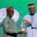 Director General, Oyo state Liasom Officer Comrade Wale Ajani recieving the Award from the Honourable Minister of Communications and Digital Economy, Professor Isa Ali Pantami,